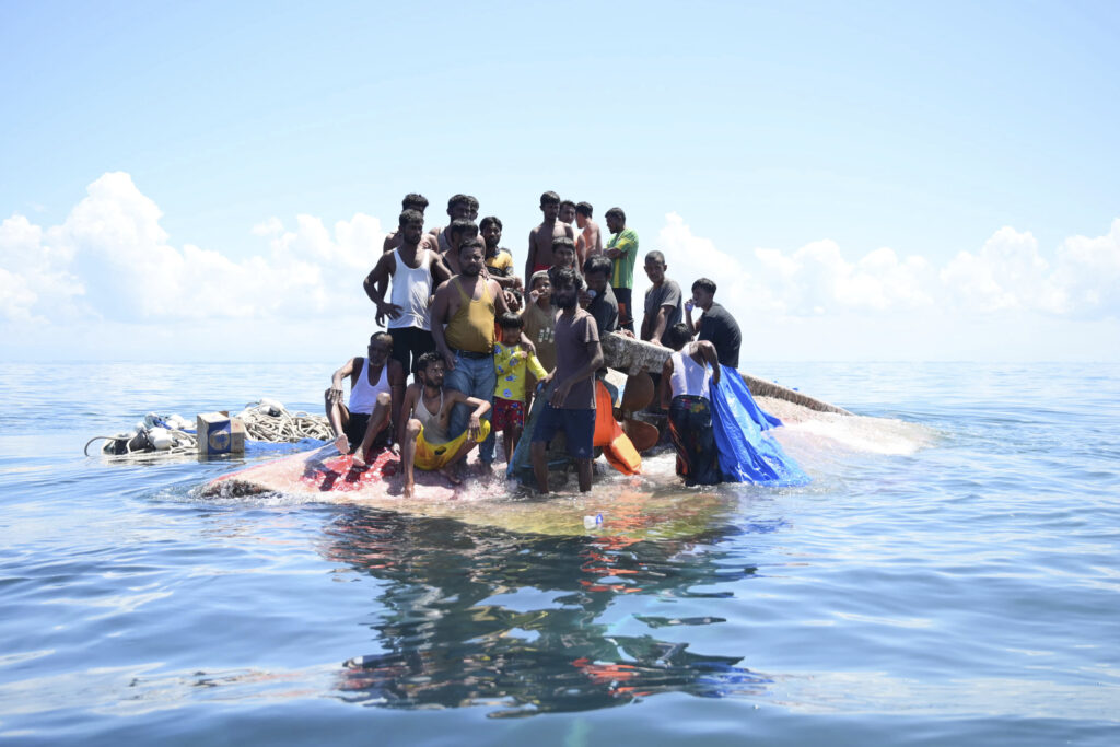 Weeping, weak and soaked refugees rescued!